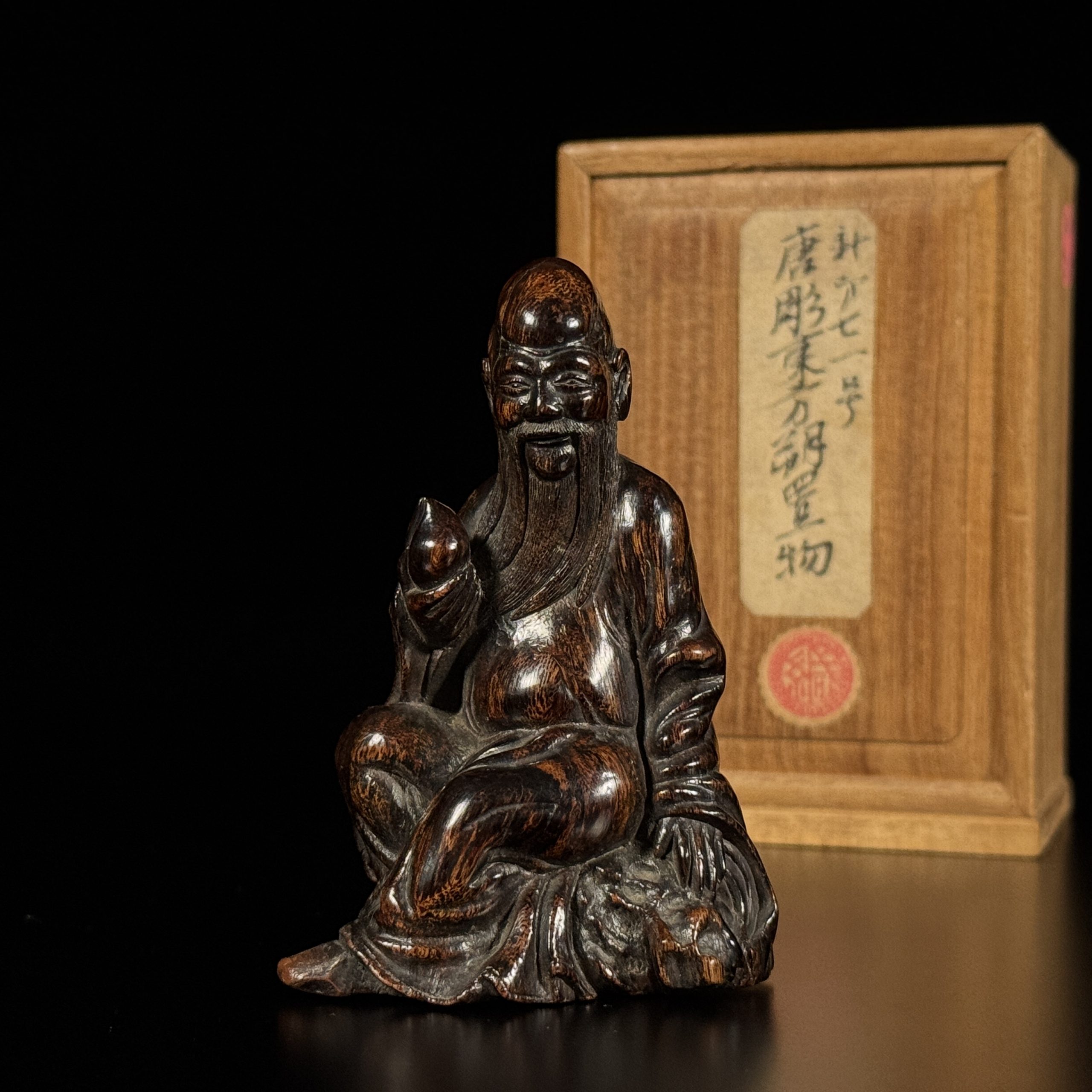 34298	明末清初 沈香木雕 東方朔 68.9g