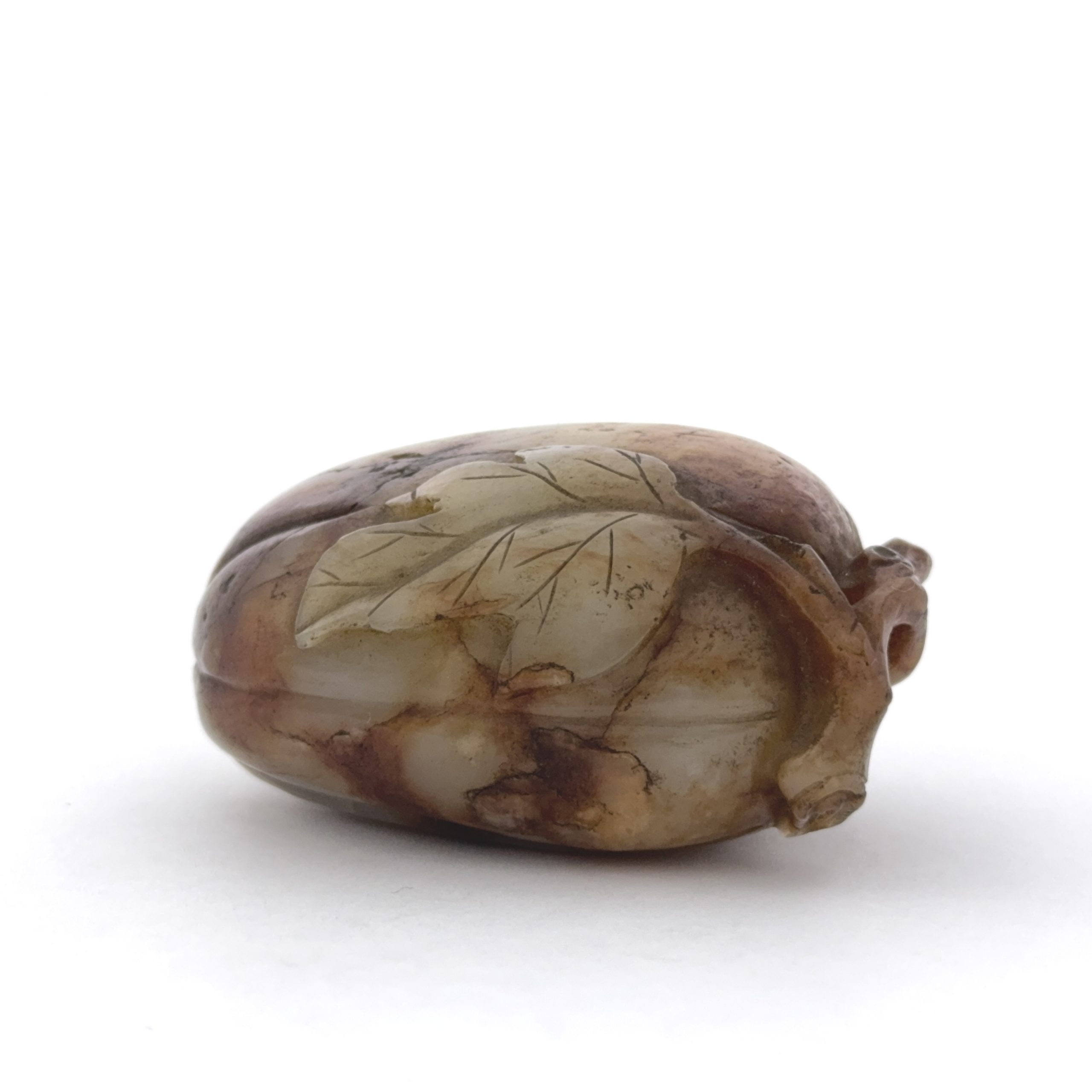 36185	清 白玉帯皮雕 瓜